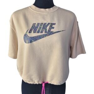 Nike woman’s cream / tan color Icon Clash Tee short sleeve size M